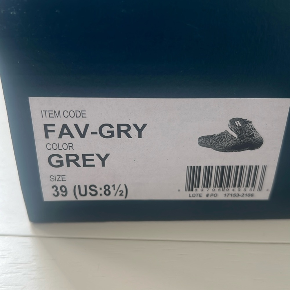 Never worn in the box house slippers. Flexus  by Spring Step in Grey.